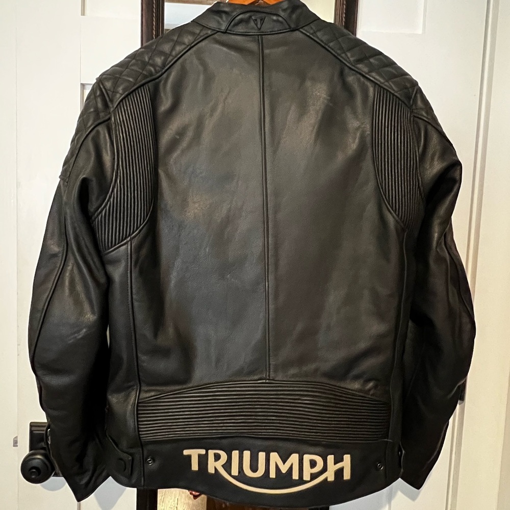Triumph men's large motorcycle jacket. In prestine condition.